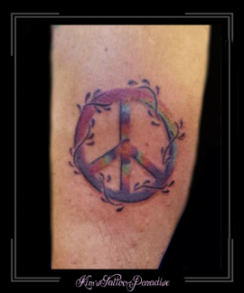 vredesteken symbool logo bovenarm